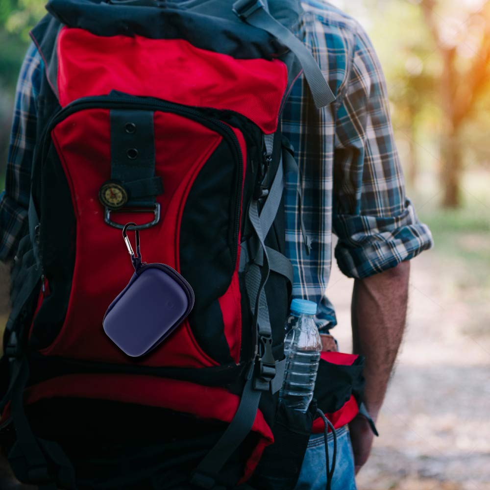 Navy portable SSD case clipped to a hiking backpack