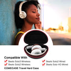 Woman wearing headphones beside the open black and red carrying case