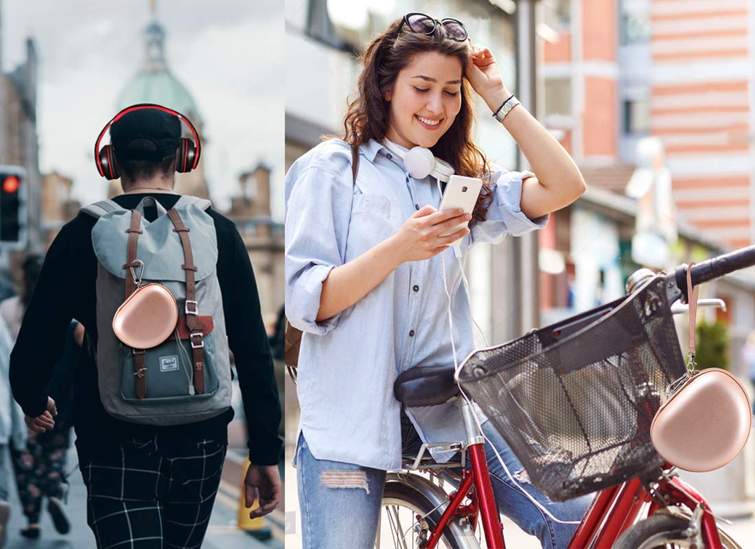 Rose gold headphone case attached to a backpack and carried by a traveler
