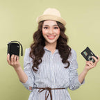 Woman holding the black and gray camera case beside a compact digital camera