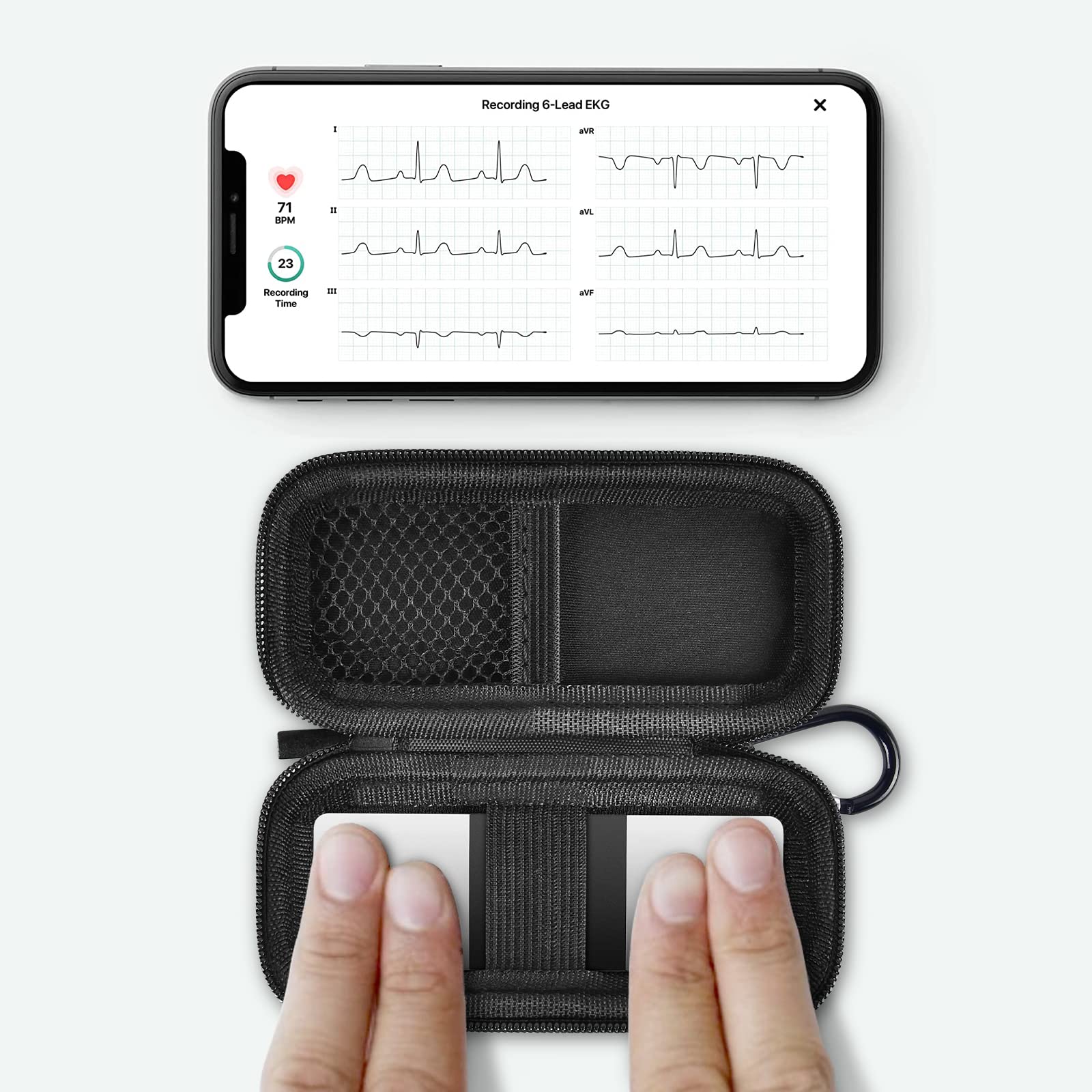 KardiaMobile 6L device used inside the open black travel case without removal