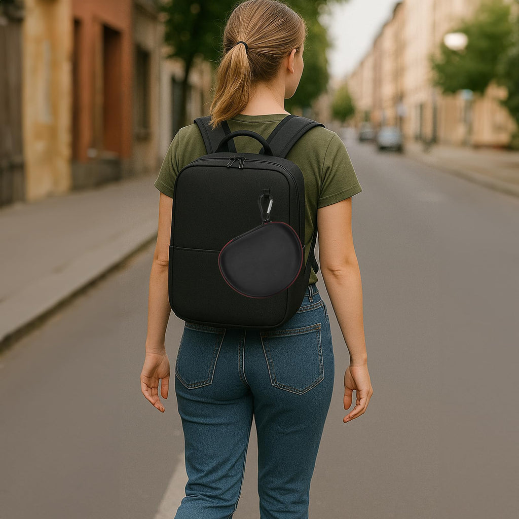 Black headphone case attached to the outside of a backpack for travel