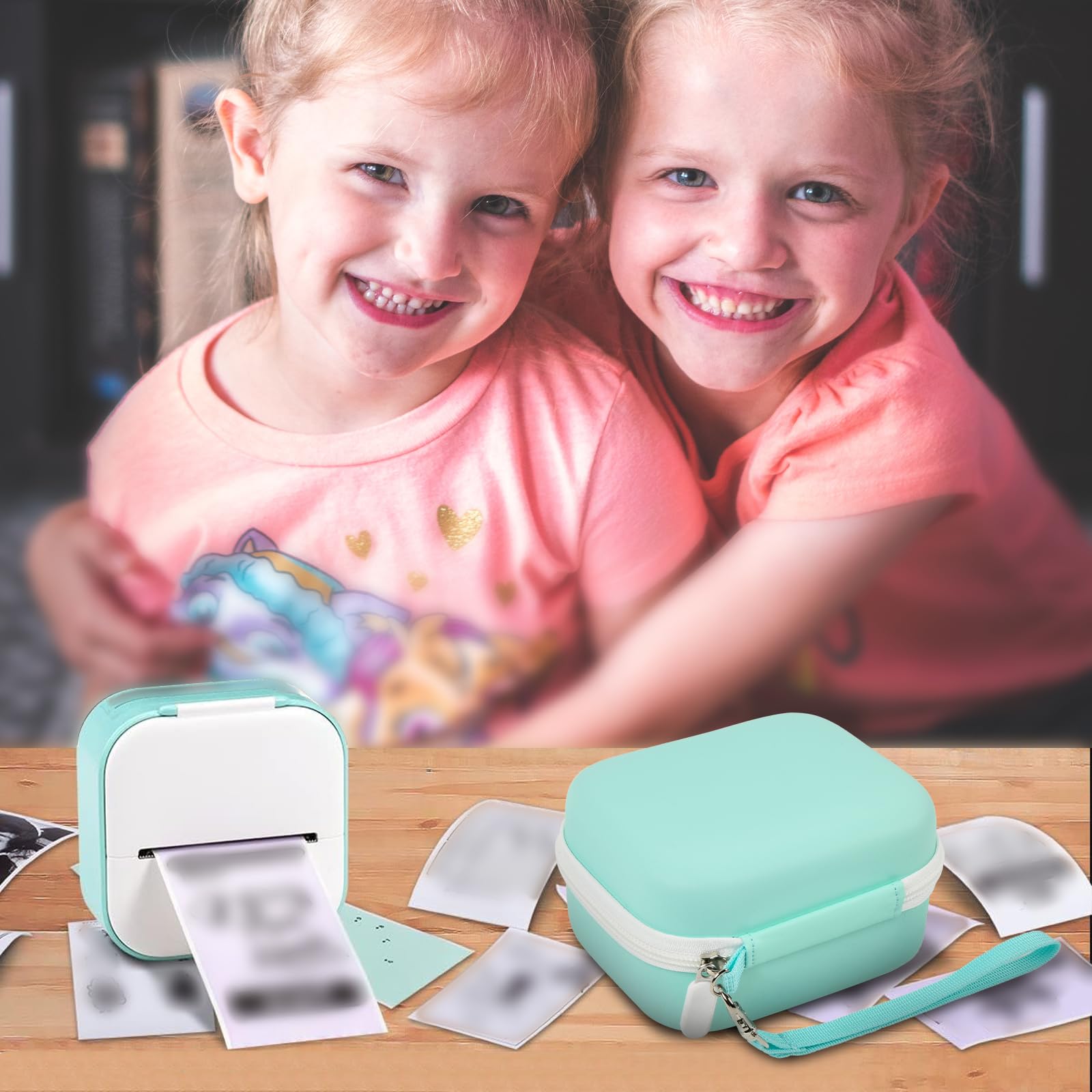 Children using a mini label printer beside the mint green carrying case