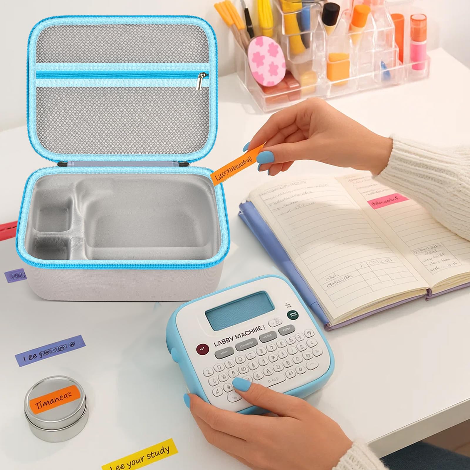 Open label maker case with molded storage compartments on an office desk