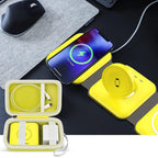 Open yellow organizer beside a foldable magnetic charging station in use on a desk