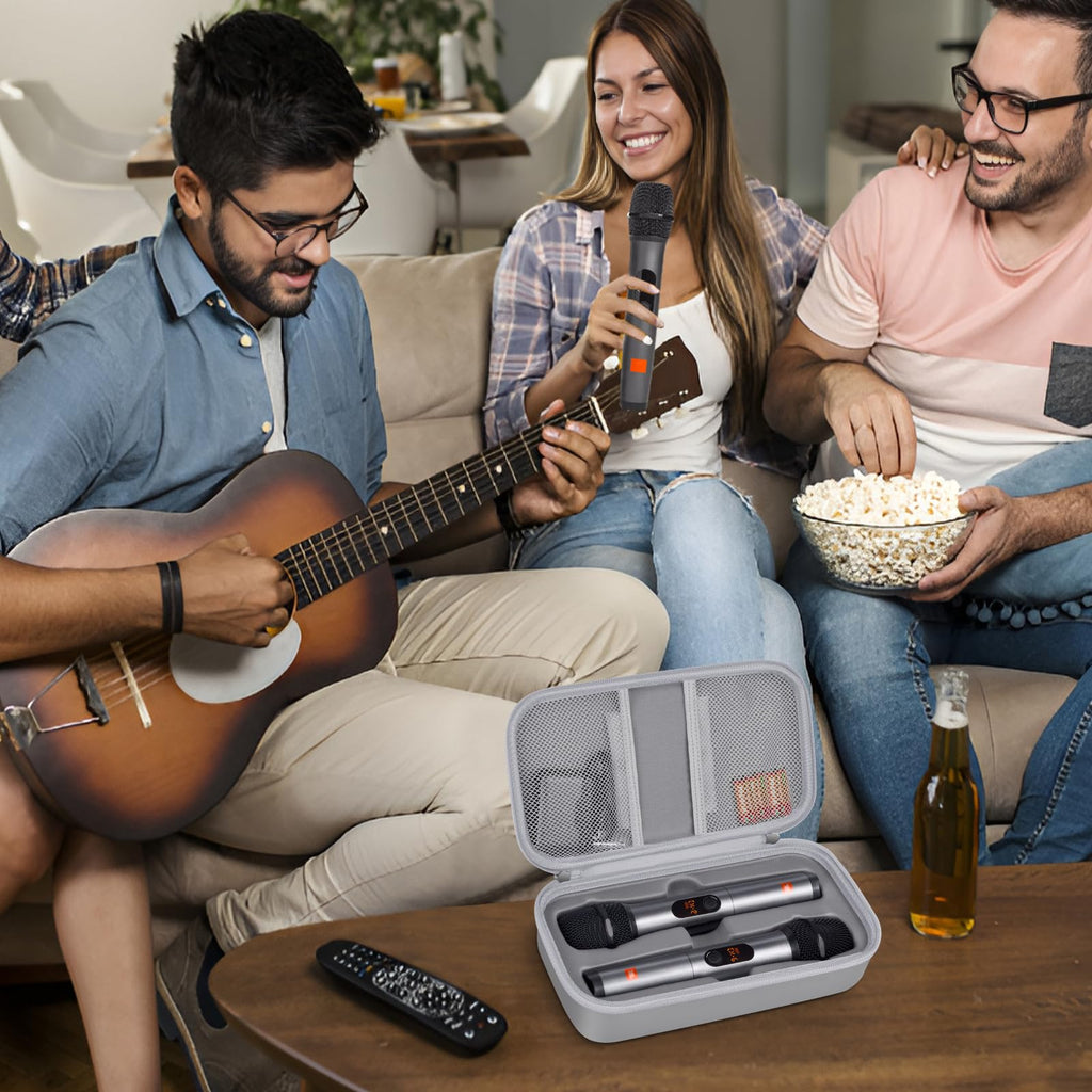 Friends using microphones and musical instruments beside the open gray microphone case