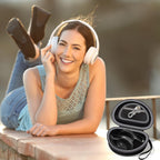Woman wearing headphones beside the open black carrying case