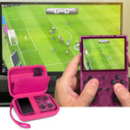Pink retro handheld console carrying case shown open beside a handheld console during gameplay
