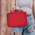 Person carrying the red and white label maker case by its handle
