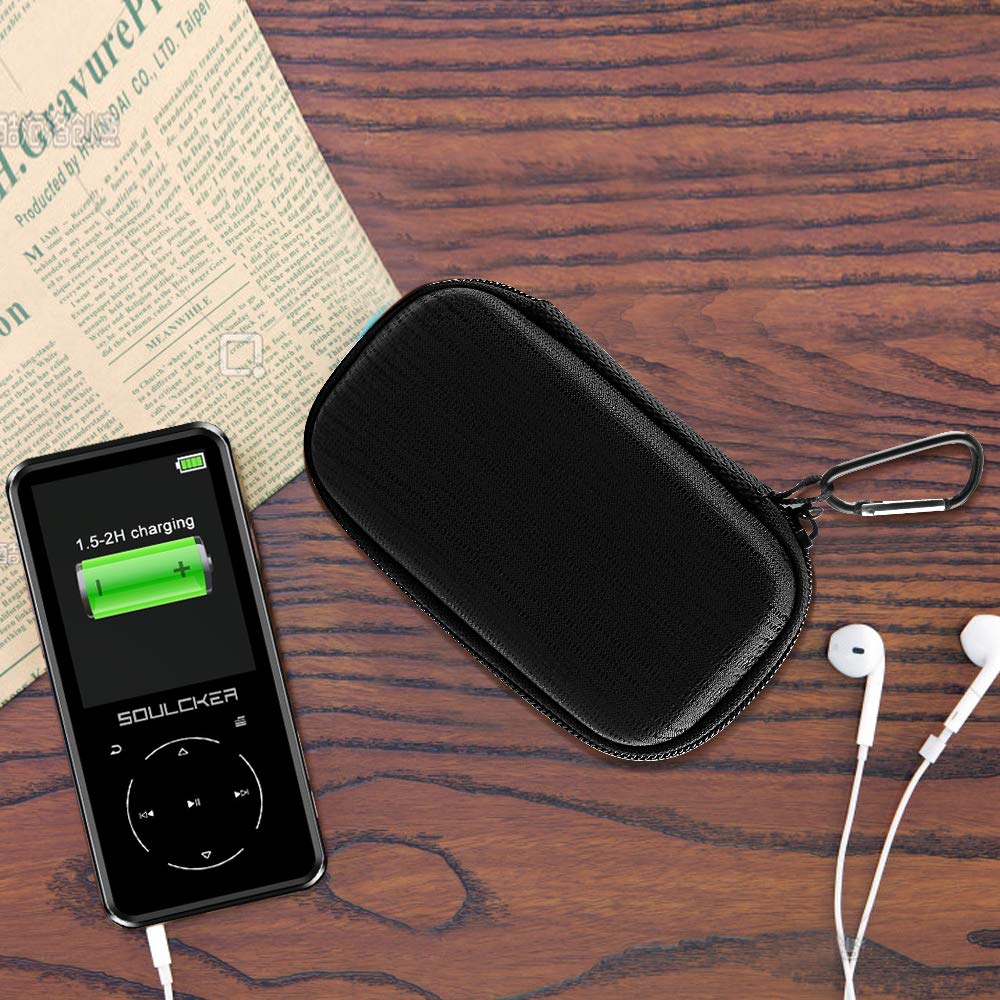 Black MP3 player protective case beside a music player and earphones on a desk