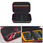 Black and red multimeter case interior with mesh pocket and padded divided compartment
