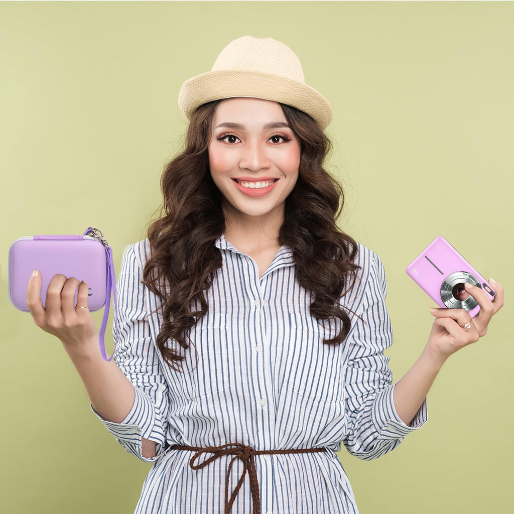 Woman holding the lavender camera case beside a compact digital camera