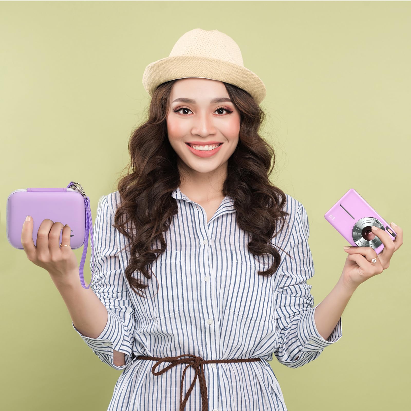 Woman holding the lavender camera case beside a compact digital camera