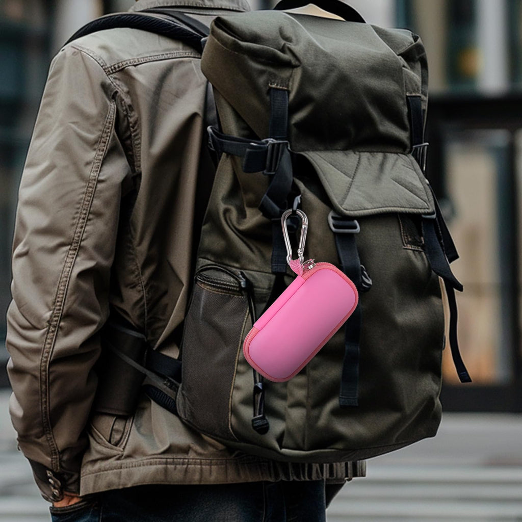 Light pink USB flash drive and SD card storage case clipped to a backpack