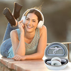 Woman wearing headphones beside the open white carrying case