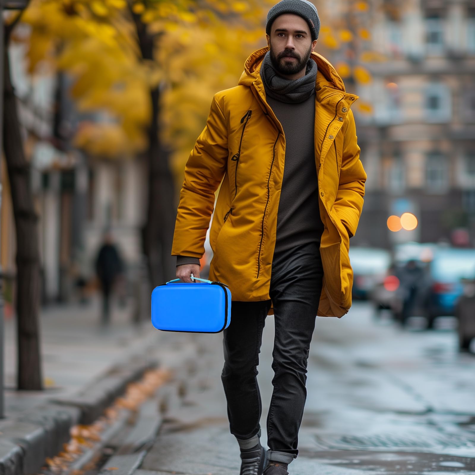 Person carrying the blue dual microphone case by its top handle