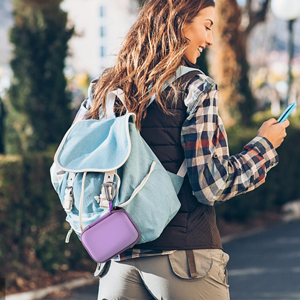 Purple mini power bank case attached to a backpack for travel