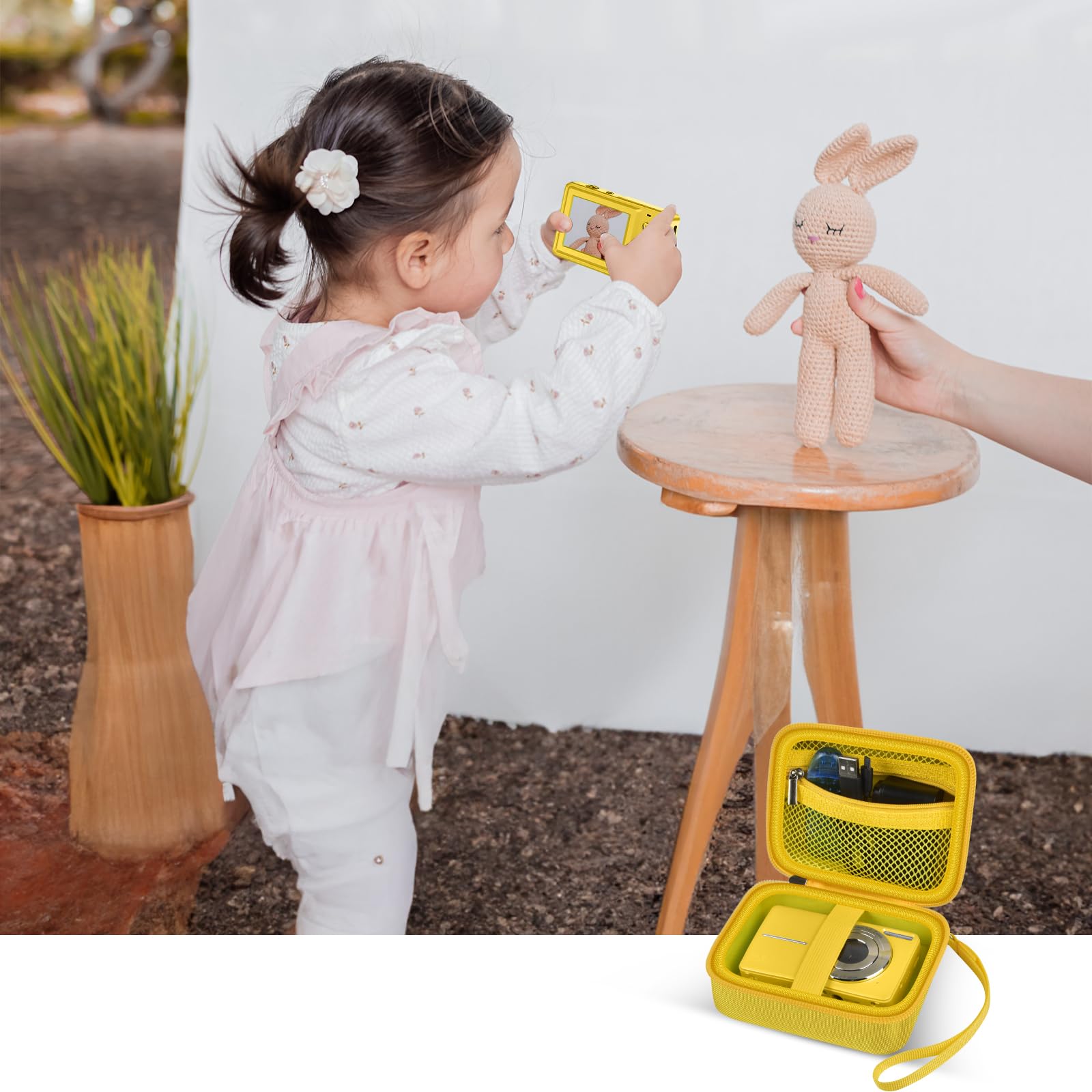 Yellow protective digital camera case shown beside a child using a compact camera
