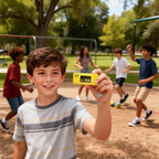 Yellow with retro camera graphic silicone case for Kodak Charmera keychain camera shown with a child using the keychain camera outdoors