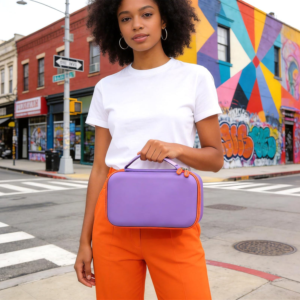 Woman carrying the purple dual microphone case by its top handle