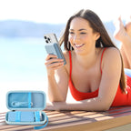 Blue carrying case beside a phone using a magnetic power bank