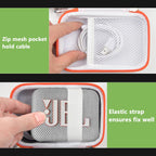 White and orange speaker case interior with mesh cable pocket and elastic strap holding a JBL Go speaker