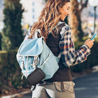 Black mini power bank case attached to a backpack for travel