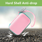 Pink and mint green hard-shell JBL Go speaker case demonstrating anti-drop protection