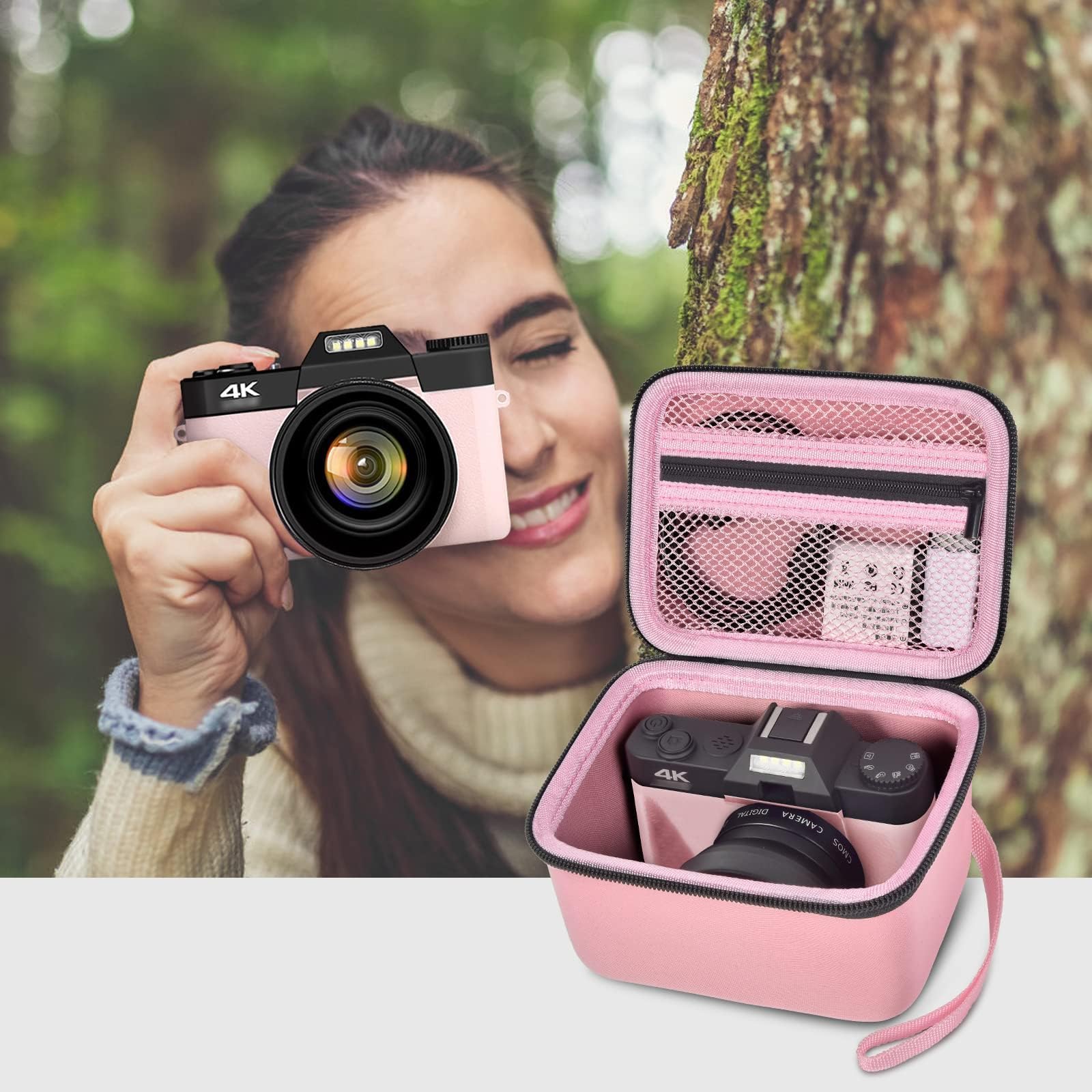 Photographer using a compact camera beside the open pink organizer