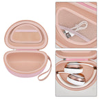 Open pink headphone case with mesh accessory pocket and folded over-ear headphones