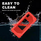 Red silicone case for Kodak Charmera keychain camera washable, easy-clean design demonstration