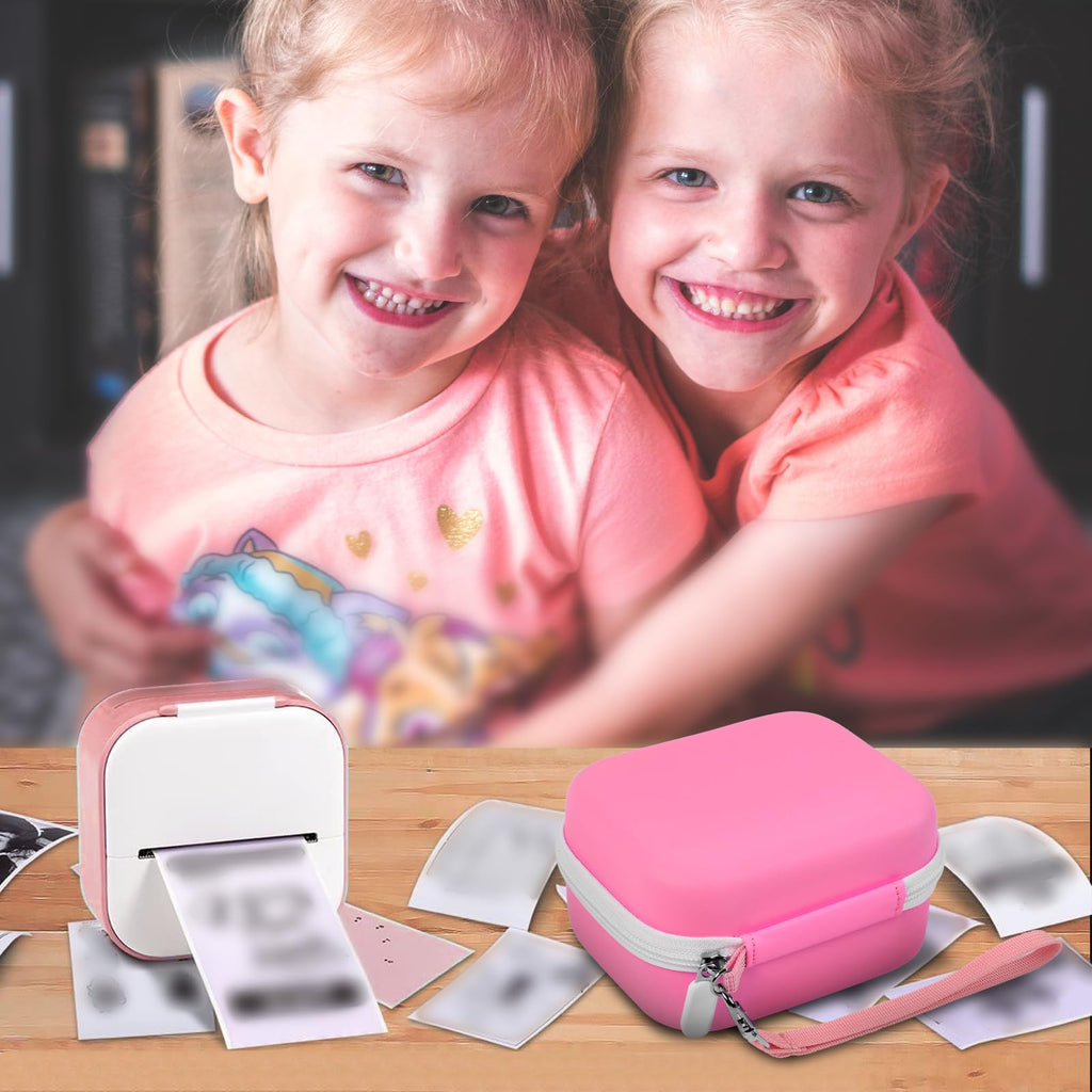 Children using a mini label printer beside the pink carrying case