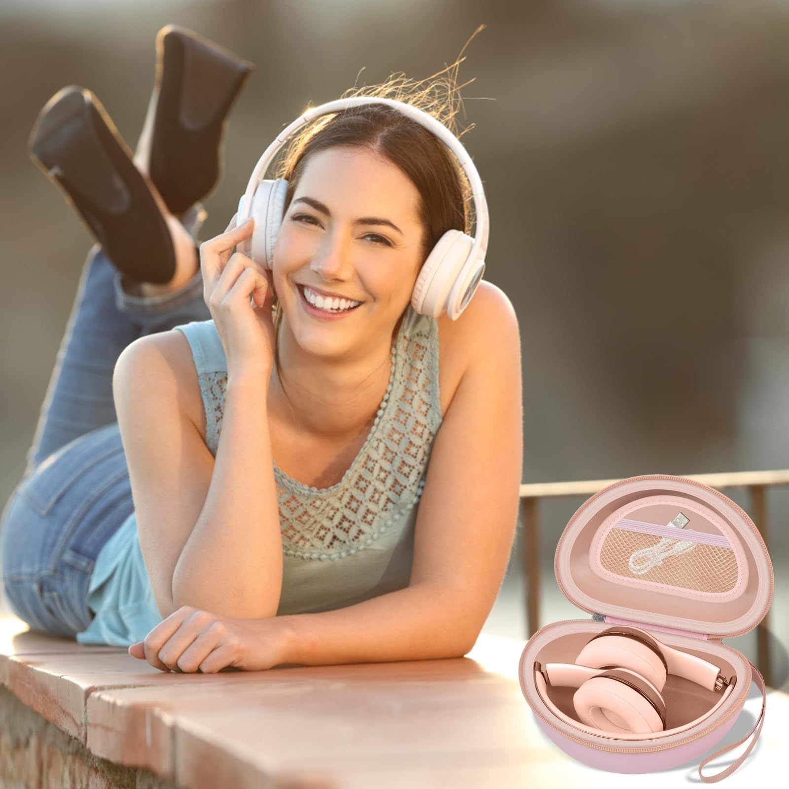 Woman wearing headphones beside the open pink carrying case