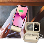 Open beige case organizing a mini power bank and cable beside a charging phone