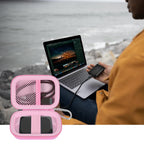 Pink Crucial SSD case demonstrating shockproof and water-resistant protection