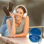 Woman wearing headphones beside the open blue carrying case