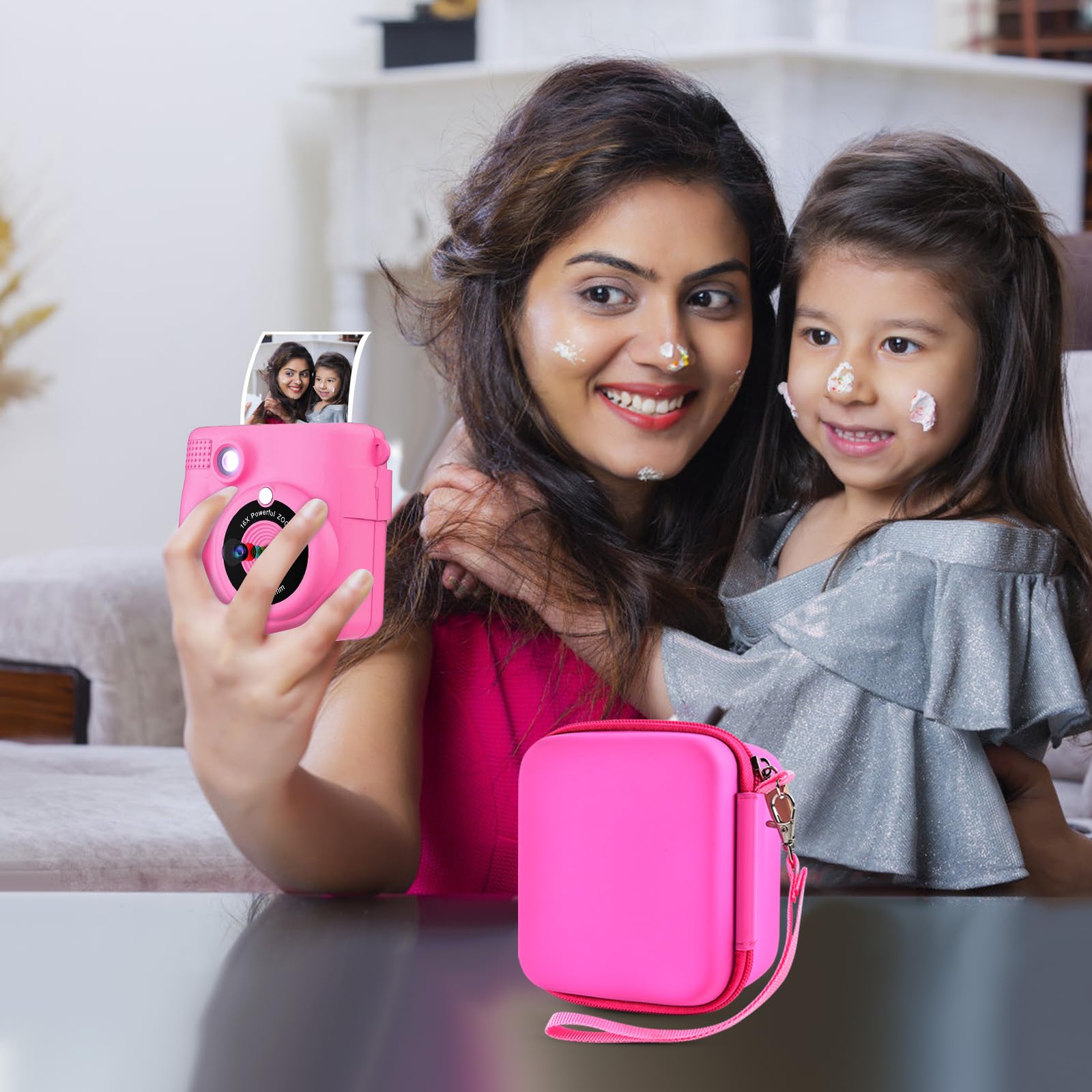 Magenta kids instant print camera case open beside a child using the camera with a parent
