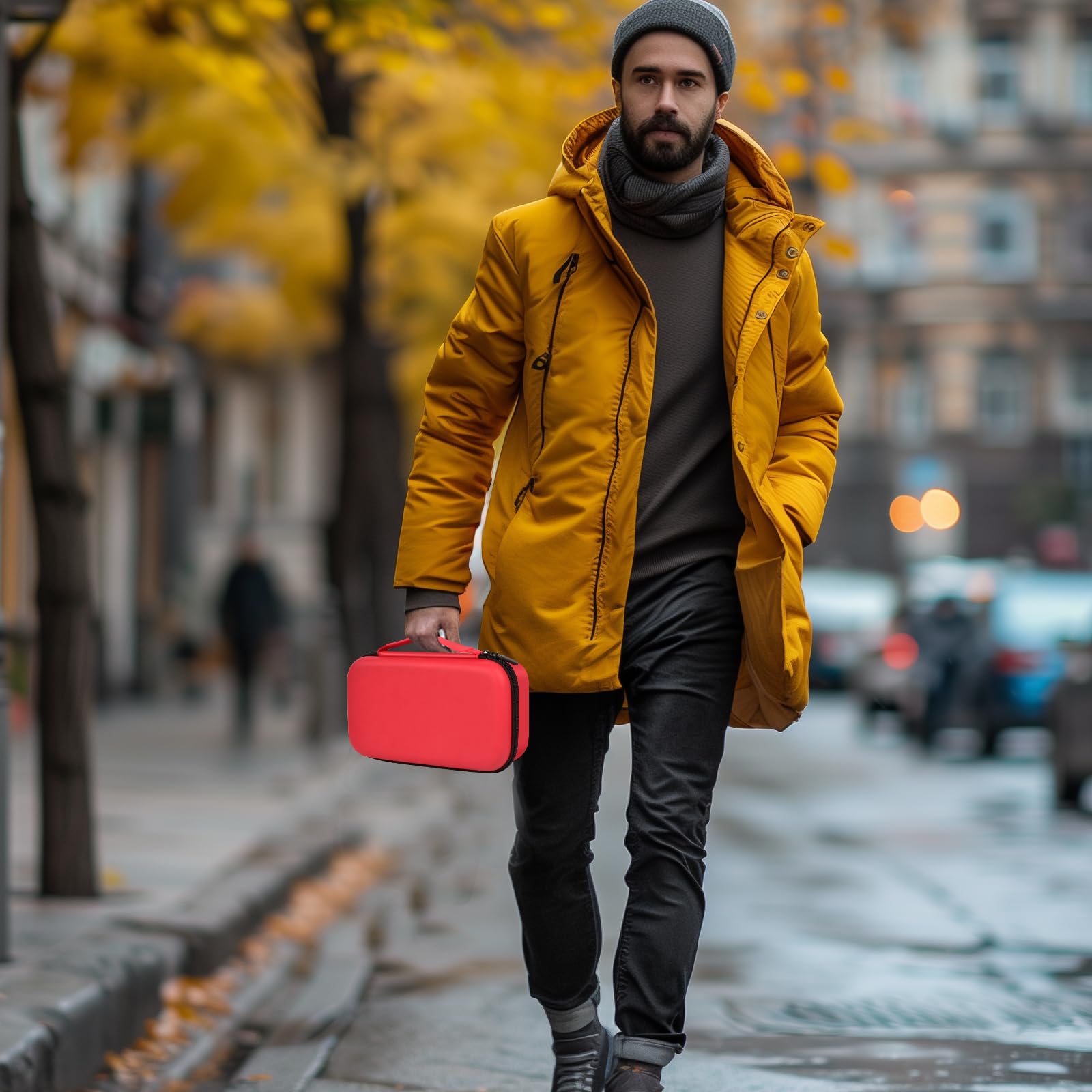 Person carrying the red dual microphone case by its top handle