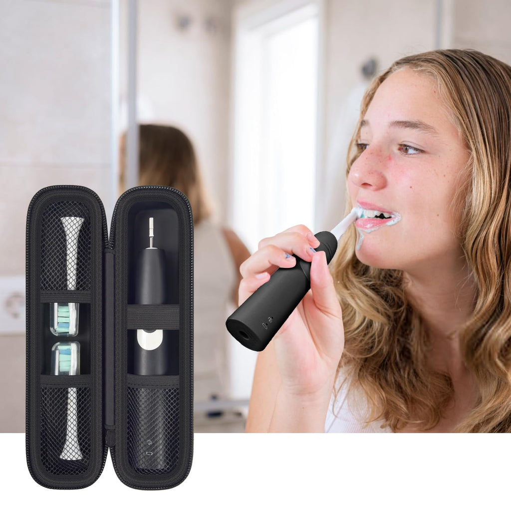 Woman brushing with an electric toothbrush beside the open black travel holder