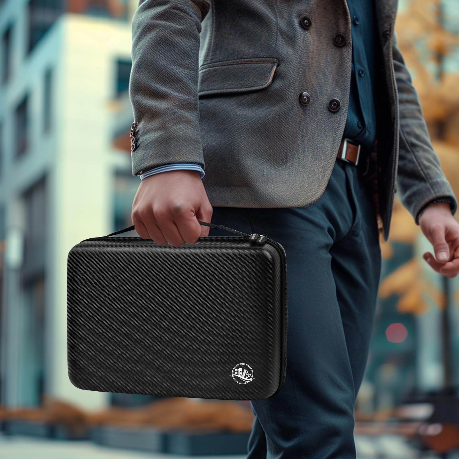 Person carrying the black barber organizer case by its top handle
