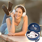Woman wearing headphones beside the open navy blue carrying case