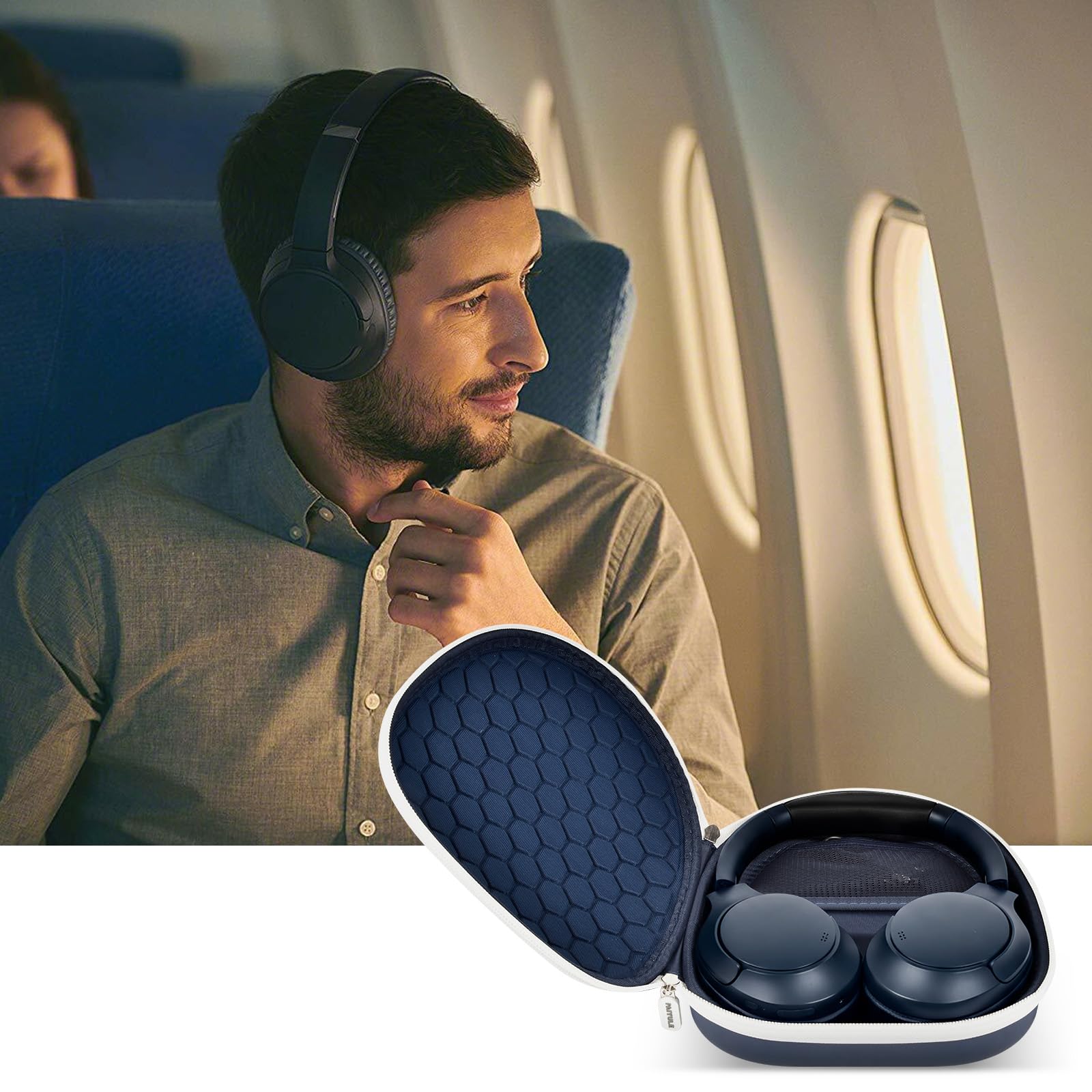 Traveler using headphones beside the open navy blue carrying case on an airplane
