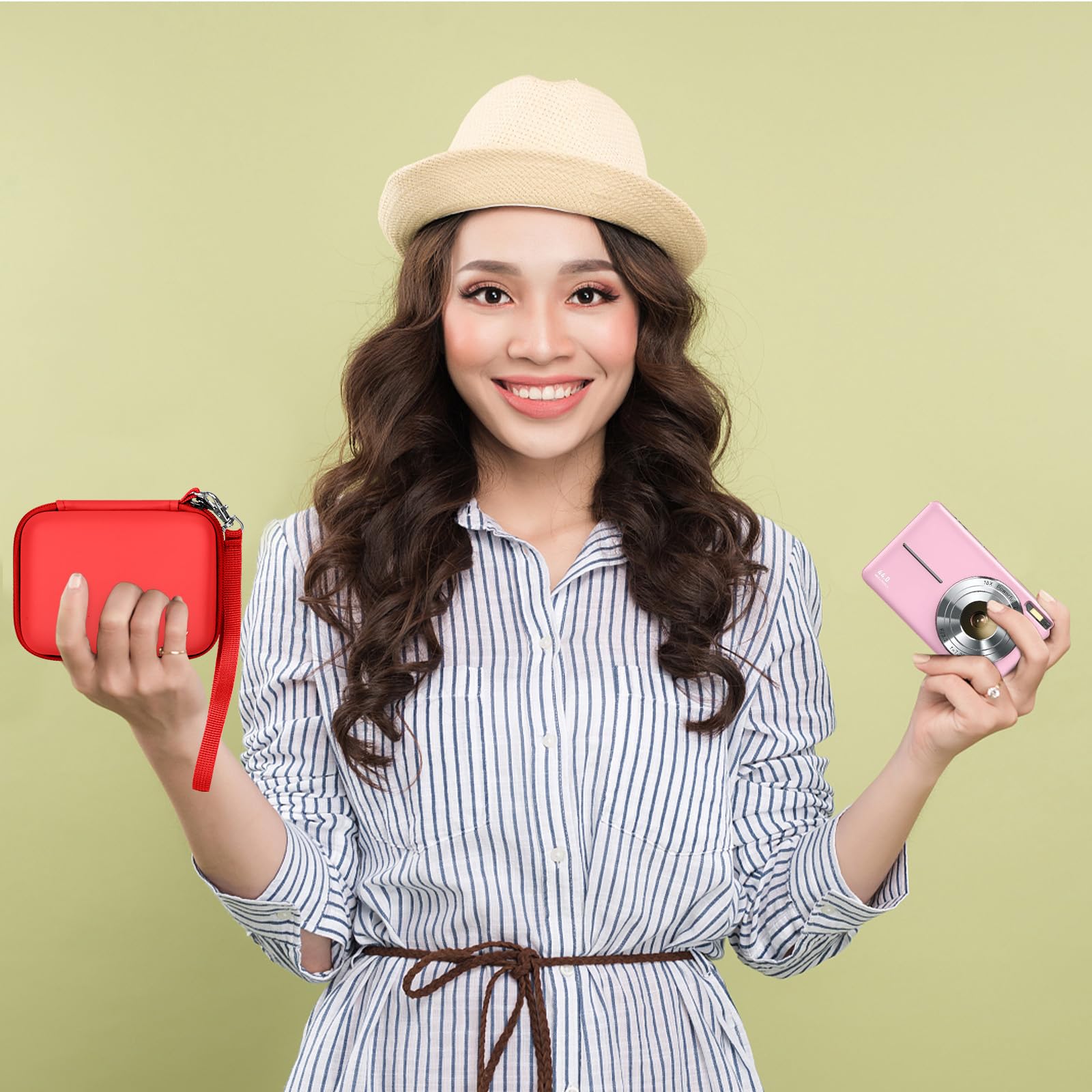 Woman holding the red camera case beside a compact digital camera