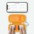 KardiaMobile 6L device used inside the open orange travel case without removal