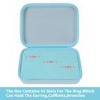 Open blue jewelry organizer showing 42 padded slots for rings and small accessories