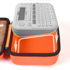 P-touch label maker fitted inside the orange carrying case