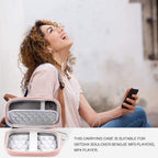 Woman holding an MP3 player beside the open rose gold protective case