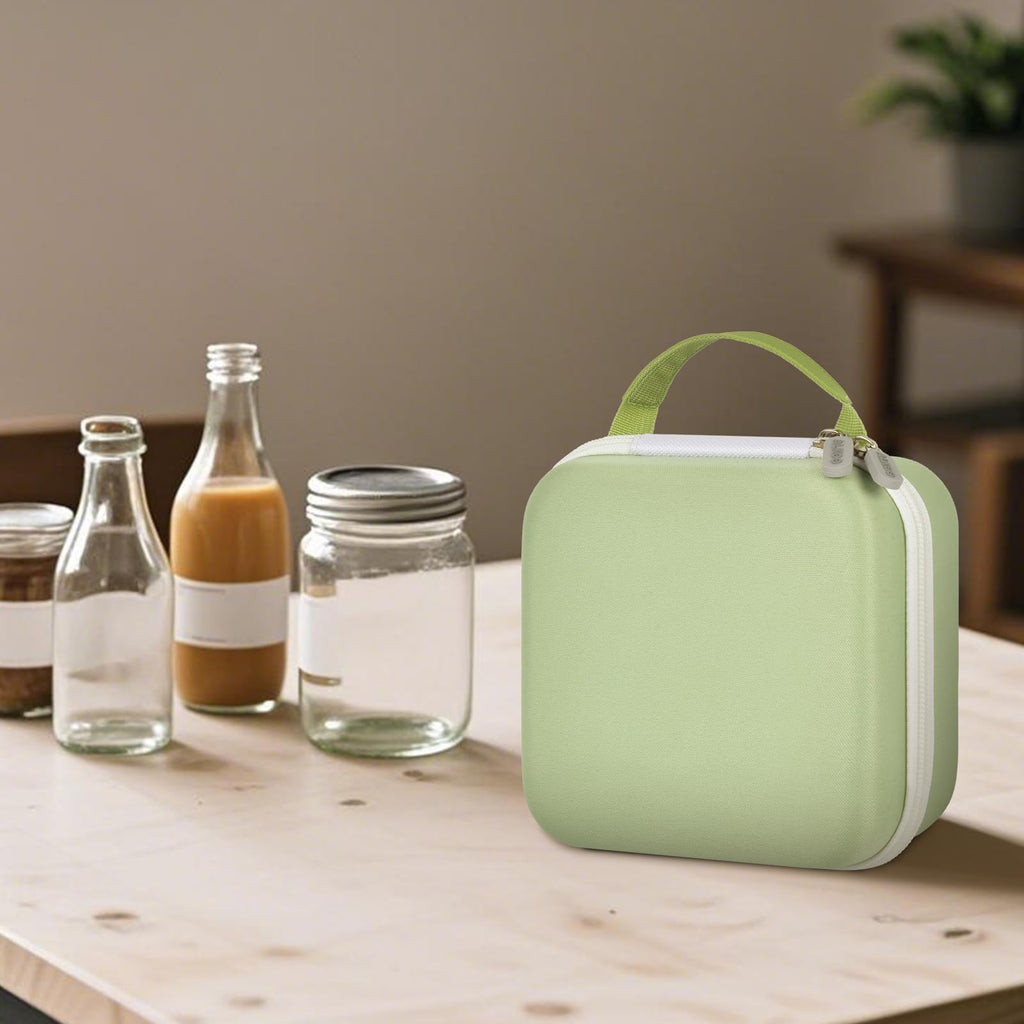 Closed light green NIIMBOT label maker case beside bottles and jars