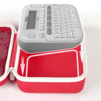 P-touch label maker fitted inside the red and white carrying case