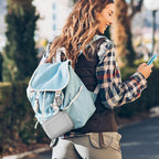 Gray mini power bank case attached to a backpack for travel